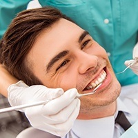 Man receiving dental exam