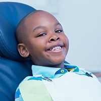 Smiling young boy in dental chair