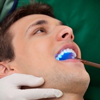 A person receiving dental bonding treatment.