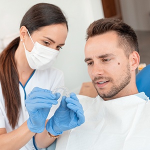 Man at dentist getting Invisalign in Huntington Beach