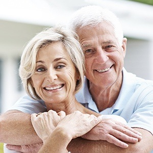 Huntington Beach Restorative Dentistry Elderly Couple smiling contently