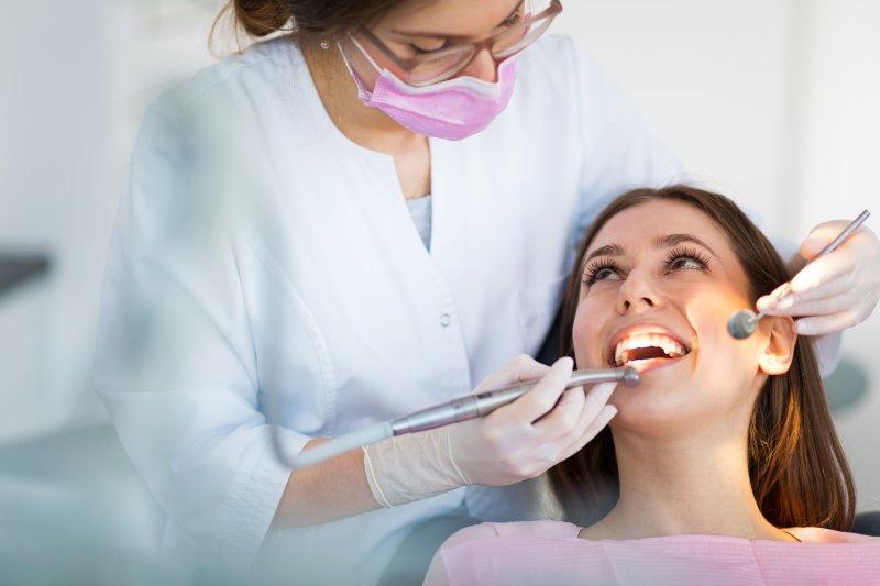 A dental patient receiving cosmetic dental treatments