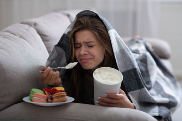 person eating ice cream and other sweets